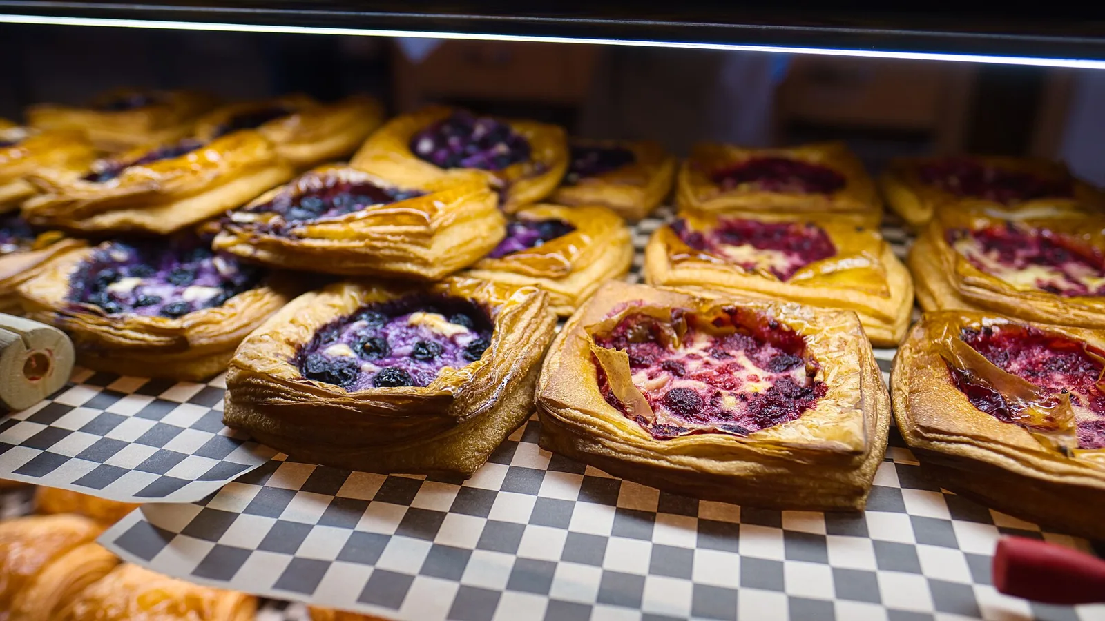 Pastries on display in a bakery case. The photo was not taken in Pembroke Pines.