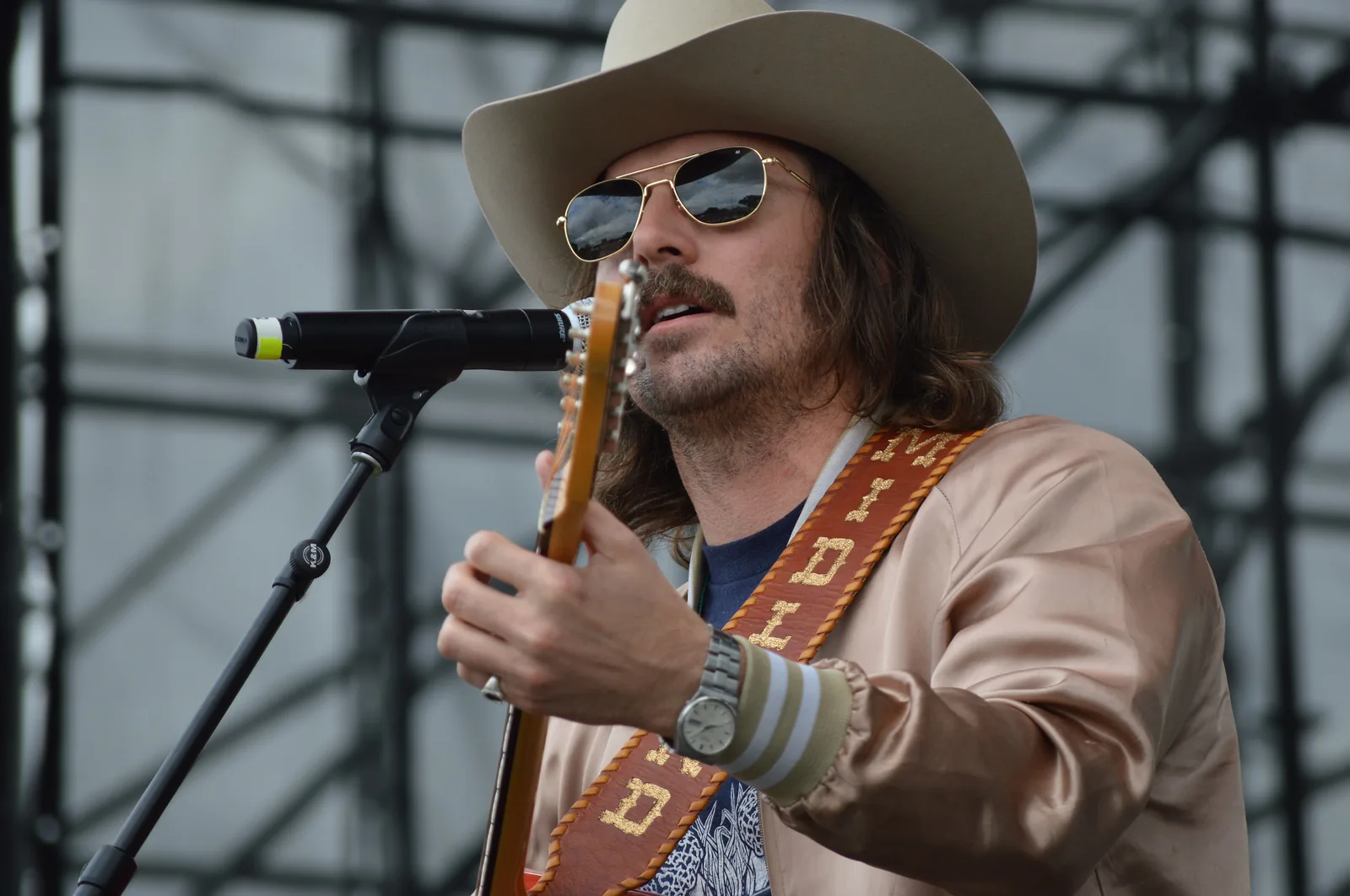 A country singer performing at an outdoor concert in Pembroke Pines.
