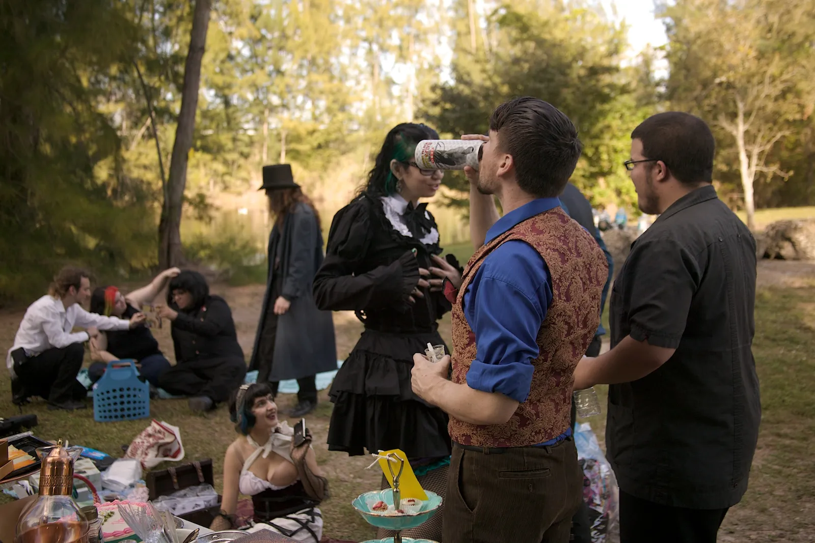 Guests in costume at a themed picnic in C.B. Smith Park in Pembroke Pines.
