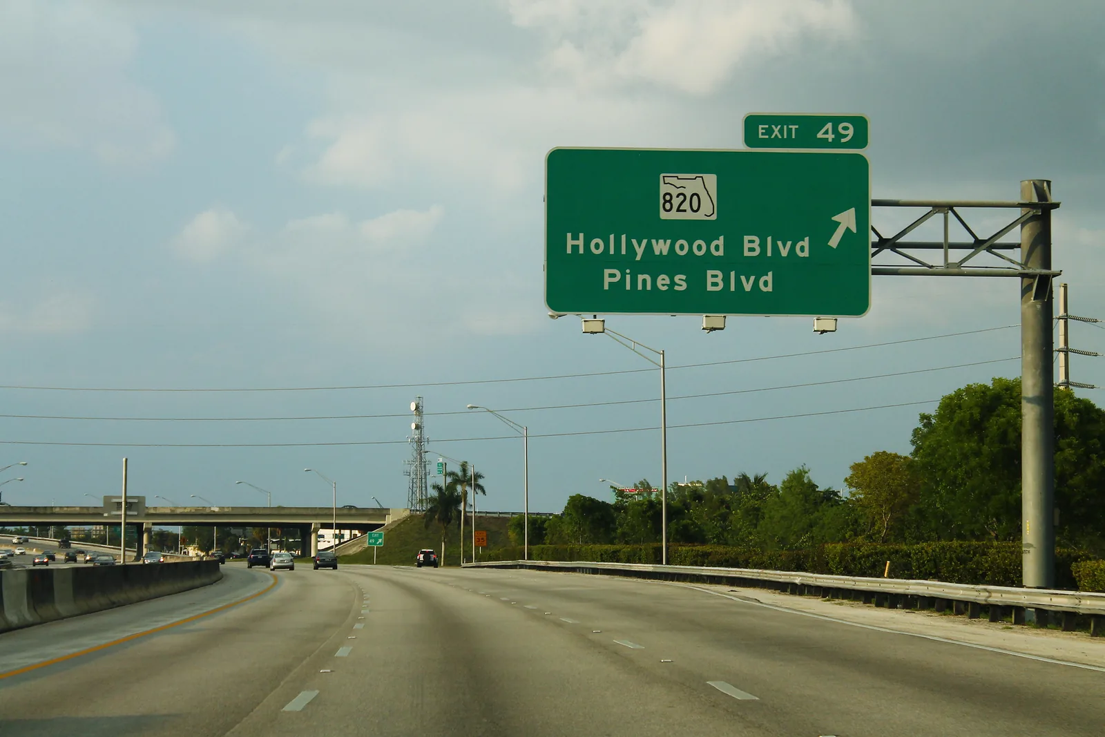 Florida's Turnpike northbound at exit 49 for Hollywood Boulevard and Pines Boulevard, on the eastern edge of Pines Village
