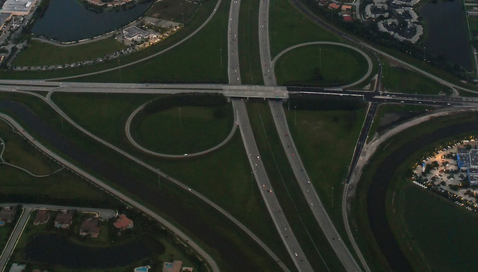 I-75 at Pines Boulevard in Pembroke Pines, with the city's western shopping centers and neighborhoods beyond.