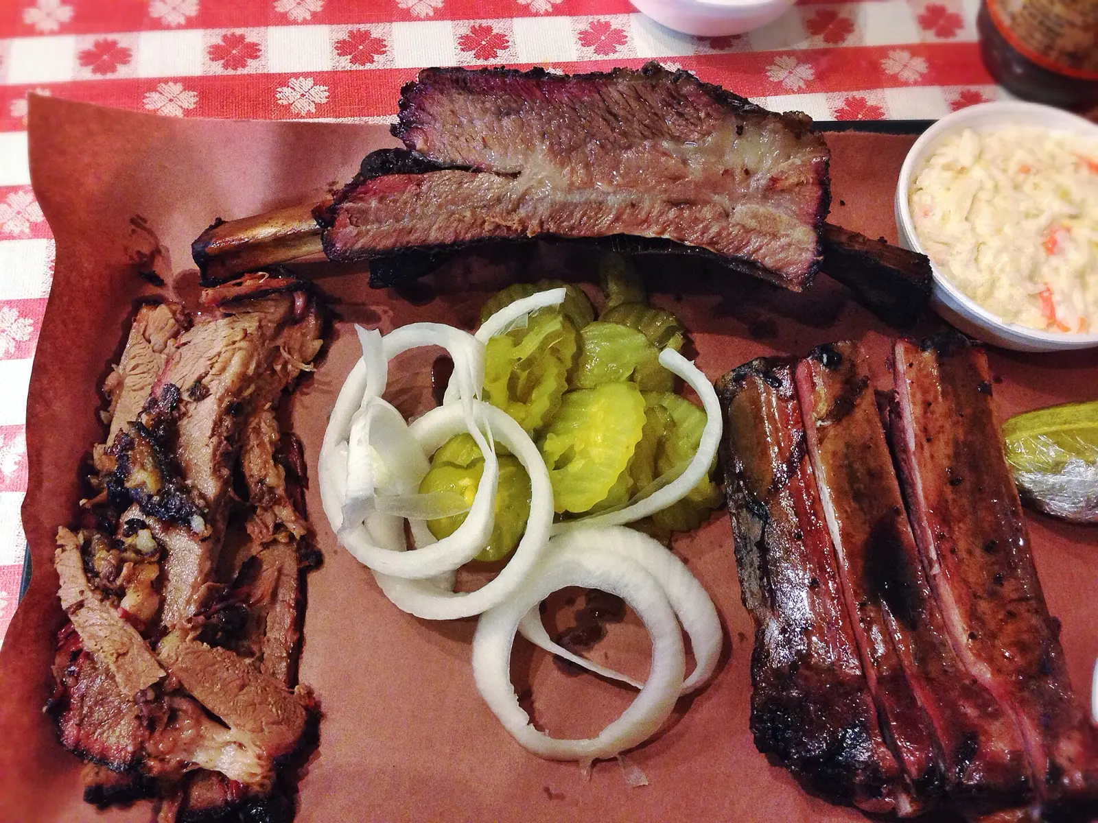 A barbecue plate of brisket, beef rib and pork ribs. The photo was not taken at a Pembroke Pines restaurant.